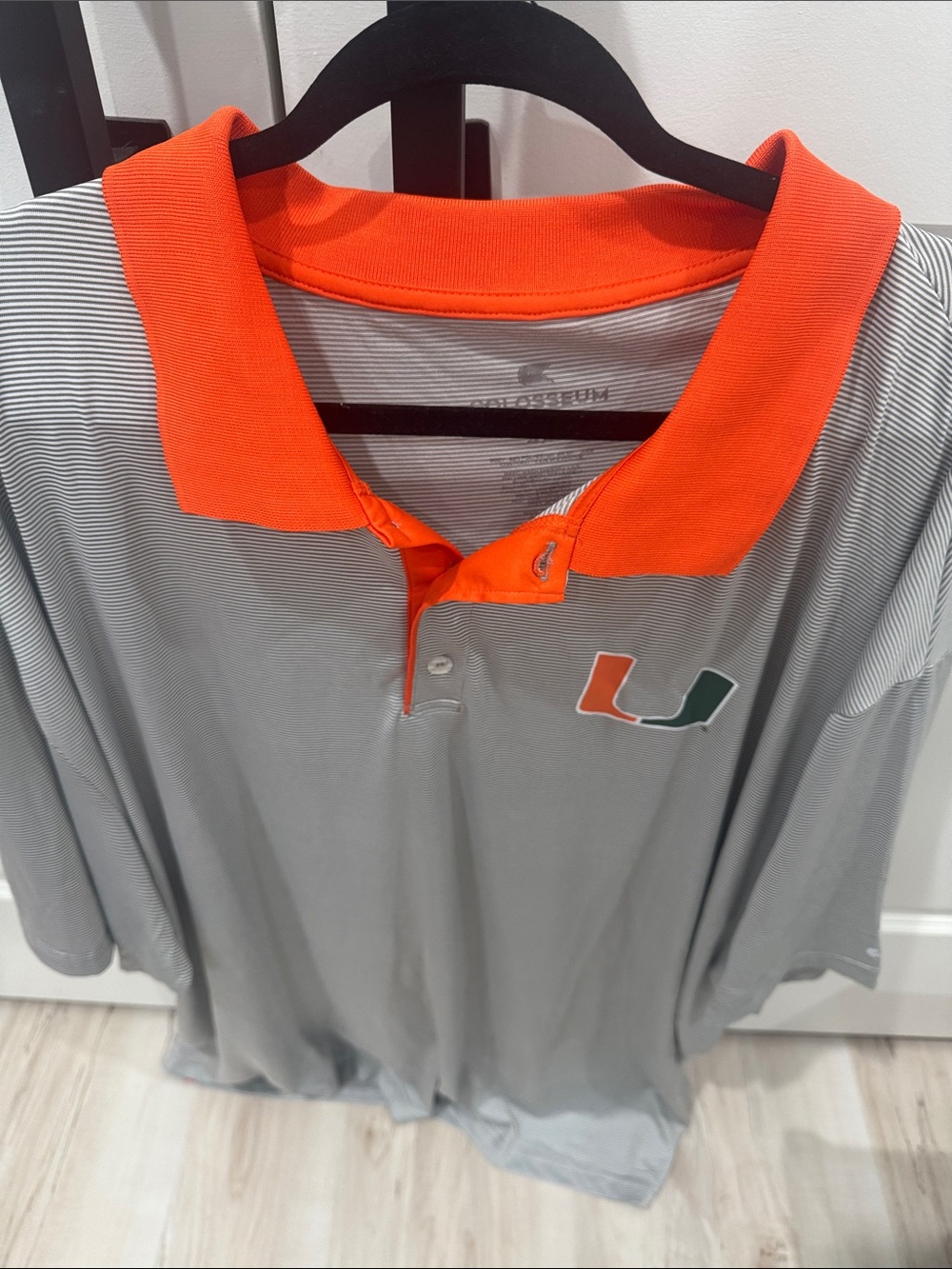 Colosseum Grey Polo with Bright Orange Collar and U Logo